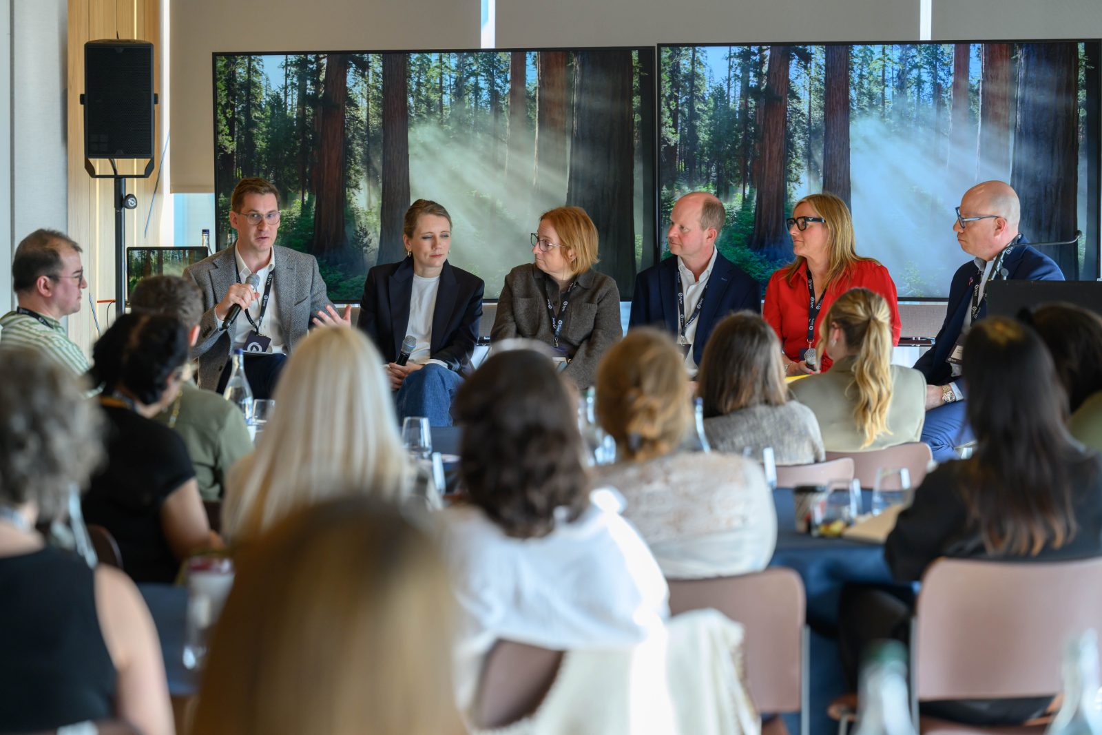 James Jameson hosting a panel discussion at Sync